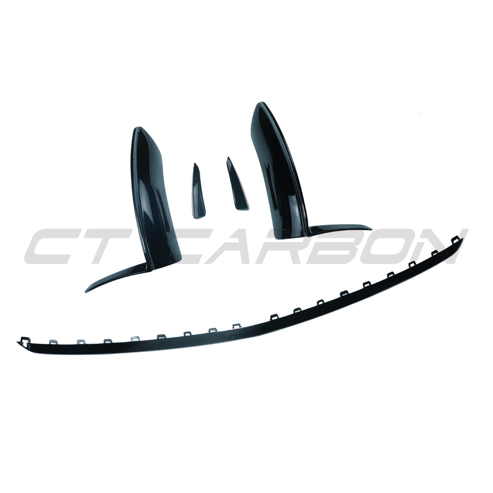 Mercedes V177 W177 A-Class 2023 gloss black splitter and canards by CT Carbon, close-up of aerodynamic car accessories.