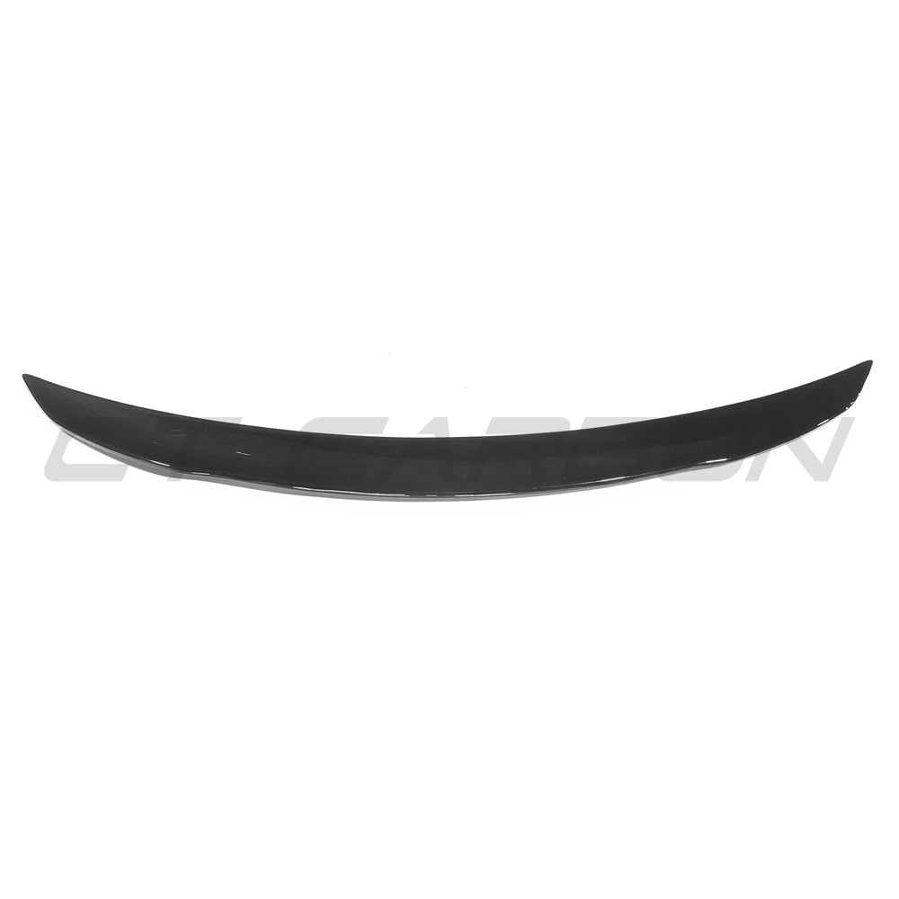 Gloss black Mercedes W118 CLA CT Carbon spoiler shown on the vehicle, highlighting its sleek aerodynamic design.
