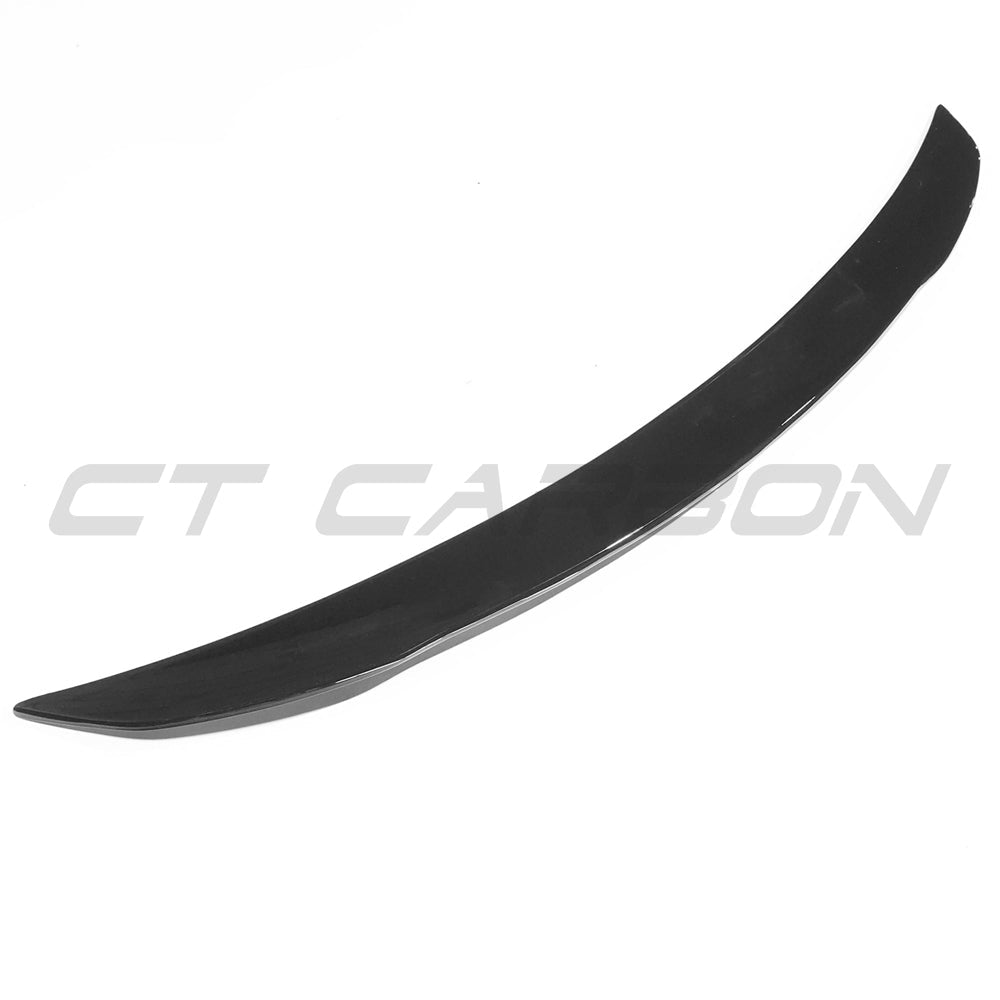 Gloss black Mercedes W118 CLA spoiler by CT Carbon, showing the sleek, aerodynamic design and mounting points.