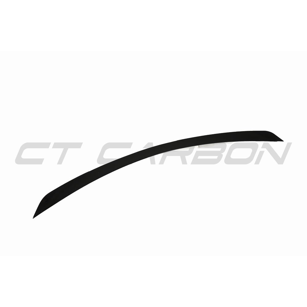 Gloss black Mercedes W213 E-Class spoiler by CT Carbon, shown installed on a 2016-2020 model, highlighting sleek aerodynamic design.