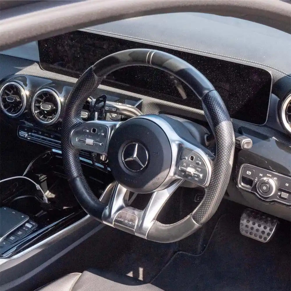 Mercedes AMG magnetic carbon fiber shifter paddles by CT Carbon, sleek black carbon fiber accessory for Mercedes AMG vehicles.
