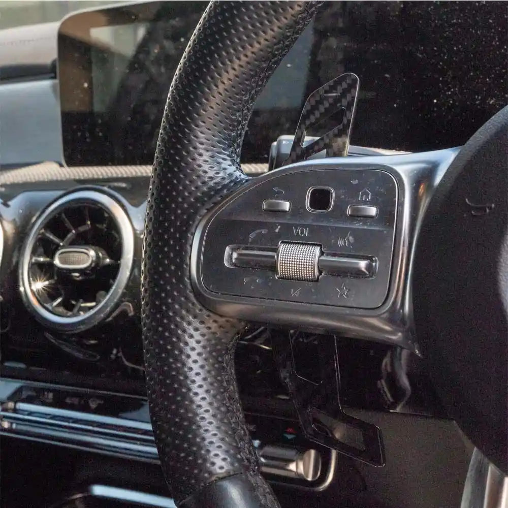 Mercedes AMG magnetic carbon fiber shifter paddles by CT Carbon, featuring sleek black carbon fiber design and ergonomic shape.