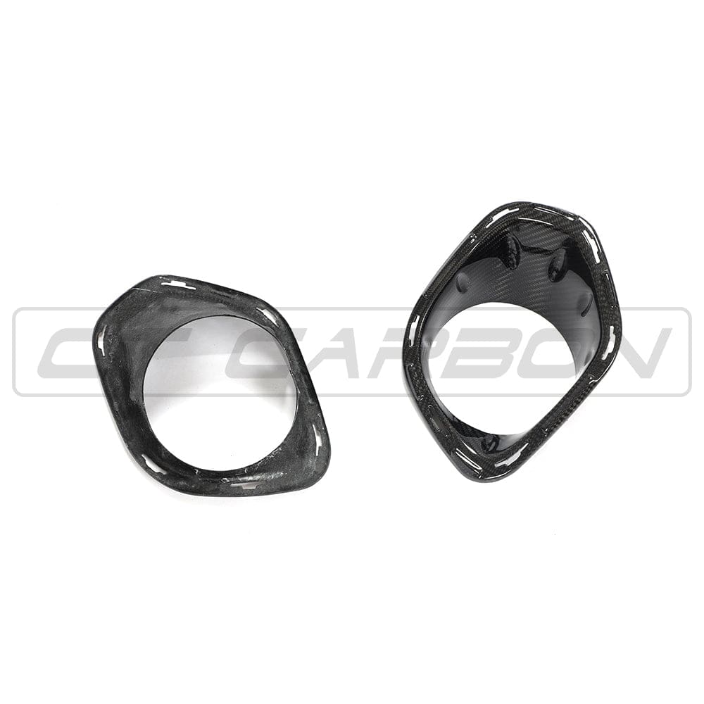 Carbon fiber fog light covers for MINI Cooper S and JCW F56 by CT Carbon, designed as sleek accessories for the vehicle.