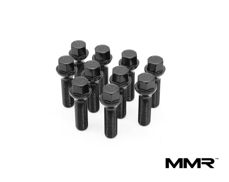 MMX Performance 12mm wheel spacers for BMW G-Series, showing the black anodized spacers and mounting hardware.