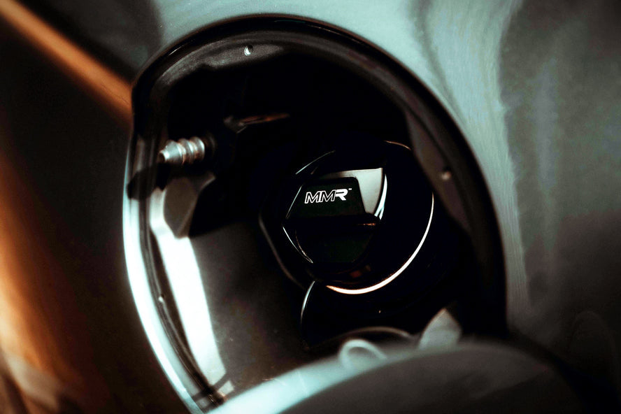 BMW Fuel Filler Cap by MMX Performance, billet aluminum design, durable and sleek automotive fuel cap with brand logo.
