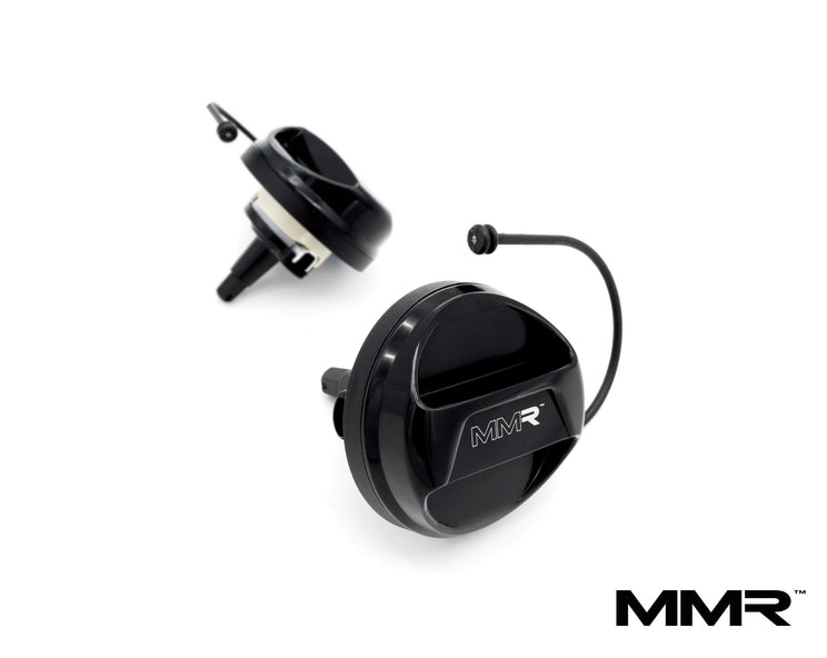 BMW billet fuel filler cap by MMX Performance, showcasing the sleek metal design and branded logo for enhanced vehicle performance.
