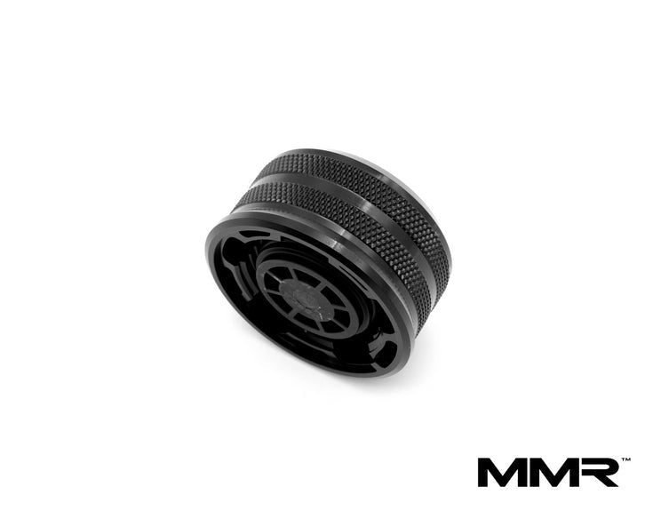 MMX Performance MMR 60mm billet coolant expansion cap for BMW, shown in a close-up with metallic finish.