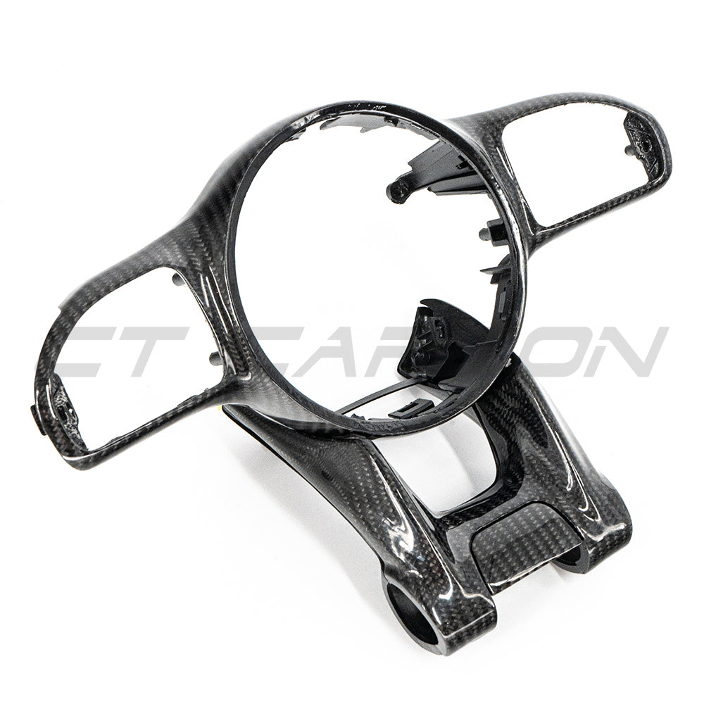 Mercedes AMG 2016+ carbon fiber steering wheel trim accessory by CT Carbon, showcasing sleek black carbon fiber finish on steering wheel.