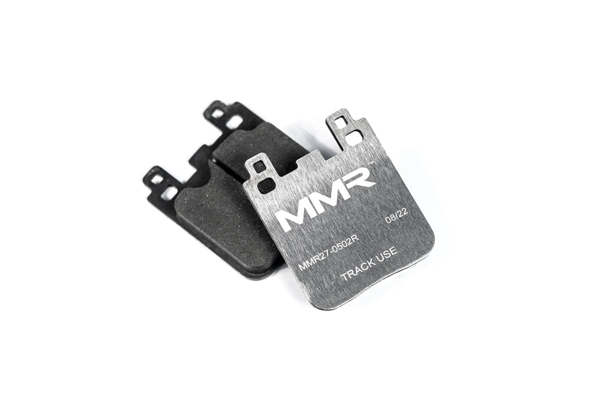 Rear brake pads for BMW F8x, F2x, F3x models by MMX Performance, designed for track use, with OE3TRACKPADREAR branding visible.