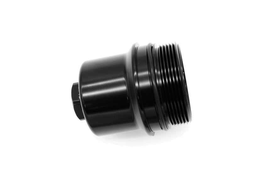 MMX Performance BMW B58 B57 oil filter housing engine bay trim, showcasing sleek metal finish and precise fitment details.