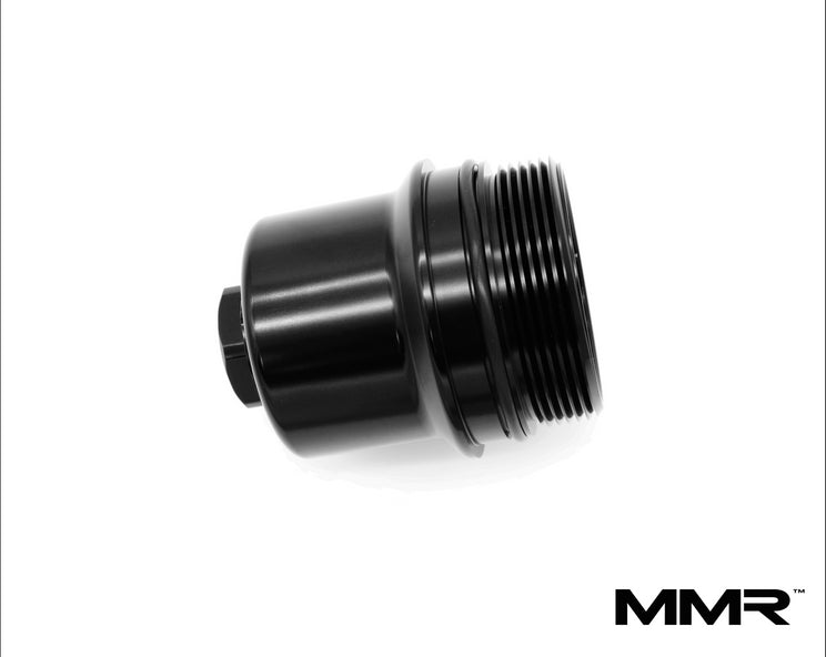 BMW B58 B57 engine bay trim featuring MMX Performance oil filter housing head, showcasing sleek design and precise fit.