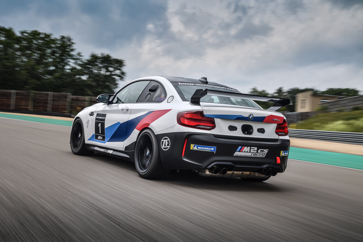 Genuine BMW Motorsport M2 CS Racing rear wing spoiler mounted on a BMW M2 CS race car.