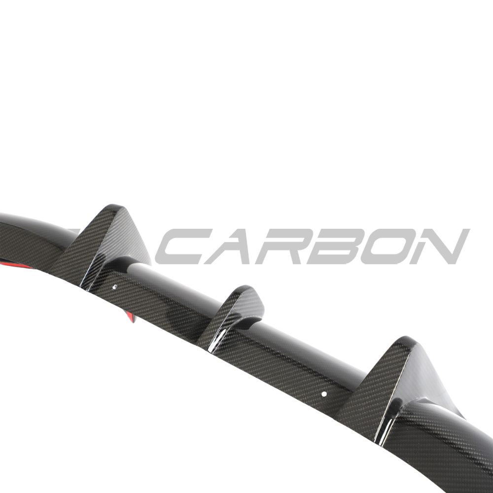 Porsche 911 992 Carrera carbon fiber diffuser by CT Design, showcasing sleek aerodynamic design and high-quality carbon fiber material.
