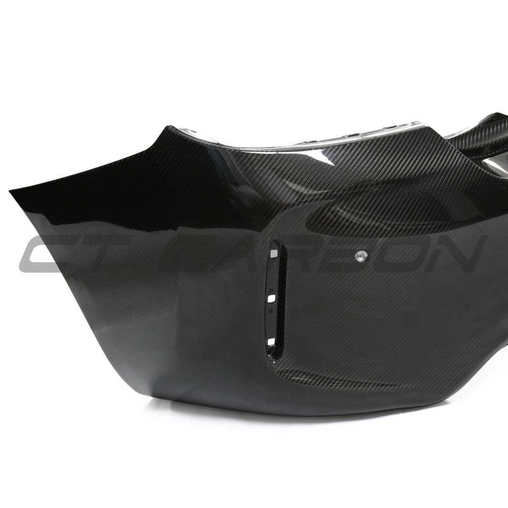 BMW F87 M2 carbon fibre bumper replacement kit by CT Carbon, showcasing sleek lightweight design and precise fitment.