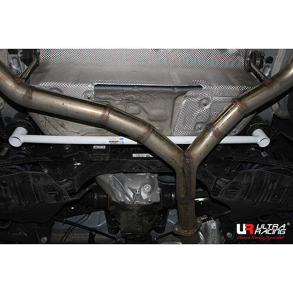 Ultra Racing BMW 1 Series F20 rear lower brace strut bar installed in the vehicle for improved chassis stability.