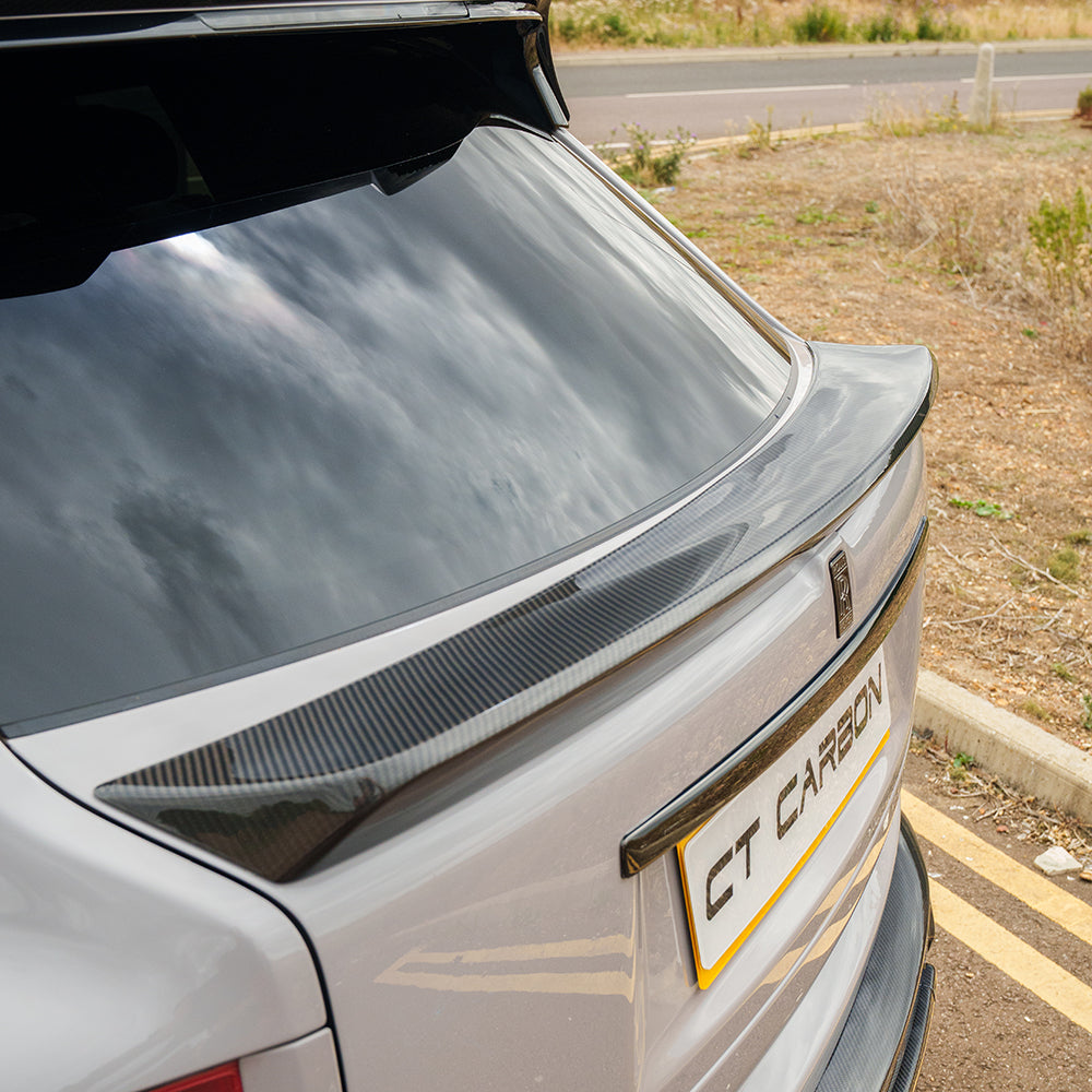 Rolls-Royce Cullinan full carbon fibre kit by CT Design, showing the middle spoiler with sleek, high-performance carbon fibre details.