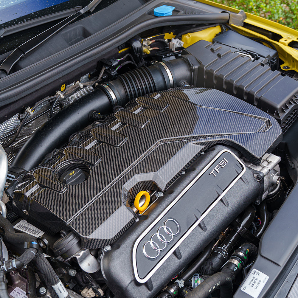 CT Carbon carbon fibre engine cover for Audi RS3 8Y 2020+, showcasing sleek, lightweight accessory with detailed carbon fibre weave.