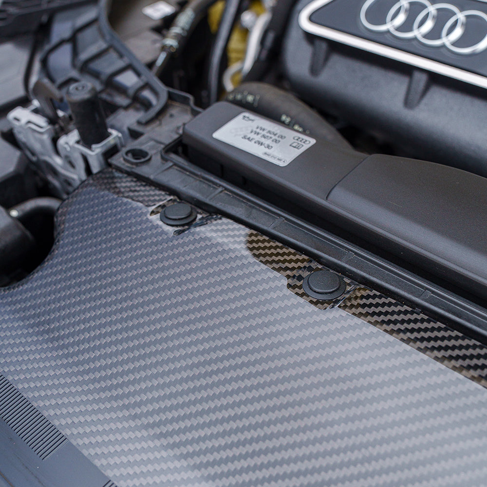 Carbon fibre engine bay scuttle trim for Audi RS3 8Y 2020+ by CT Carbon, shown installed in the engine compartment.