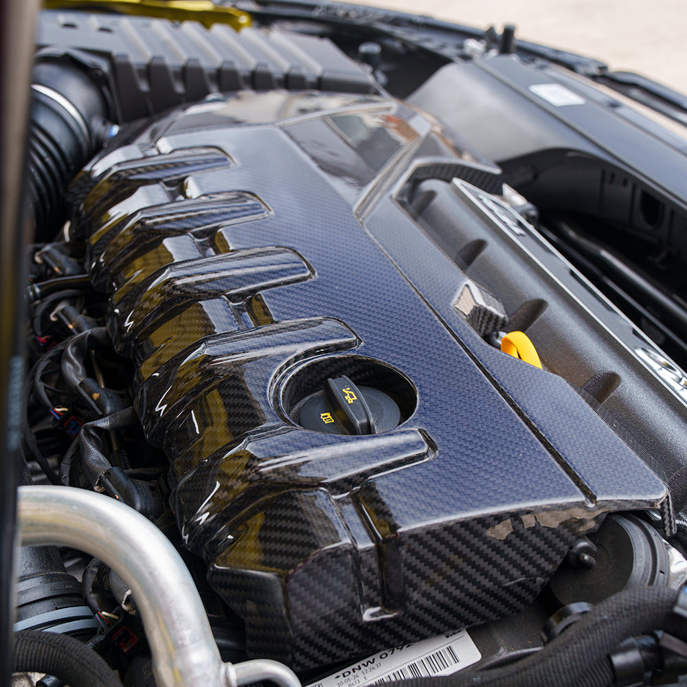 Carbon fibre engine cover for Audi RS3 8Y 2020+ by CT Carbon, showcasing sleek, lightweight automotive accessories.