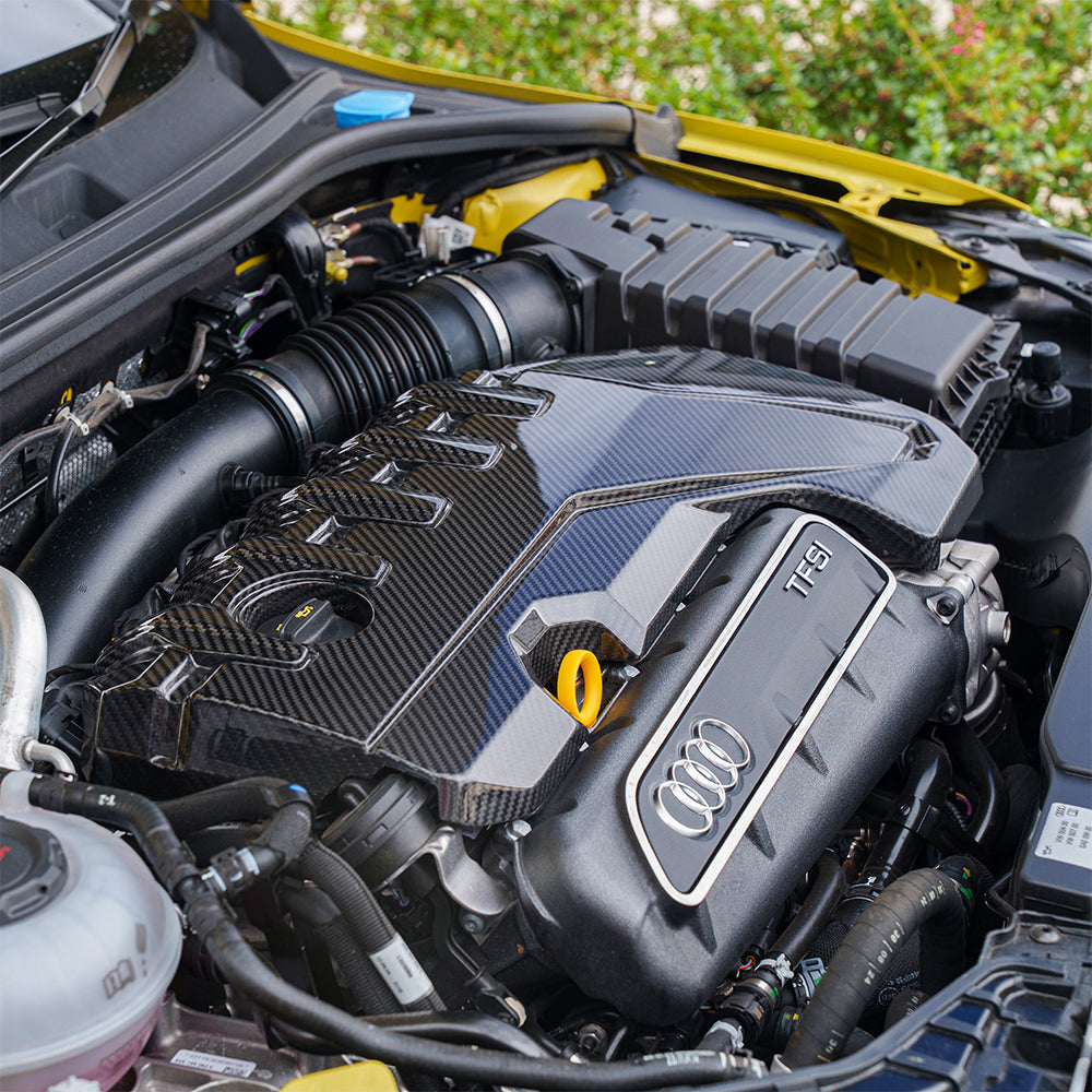 CT Carbon Audi RS3 8Y 2020+ carbon fibre engine cover, sleek and lightweight automotive accessory for enhanced engine bay appearance.