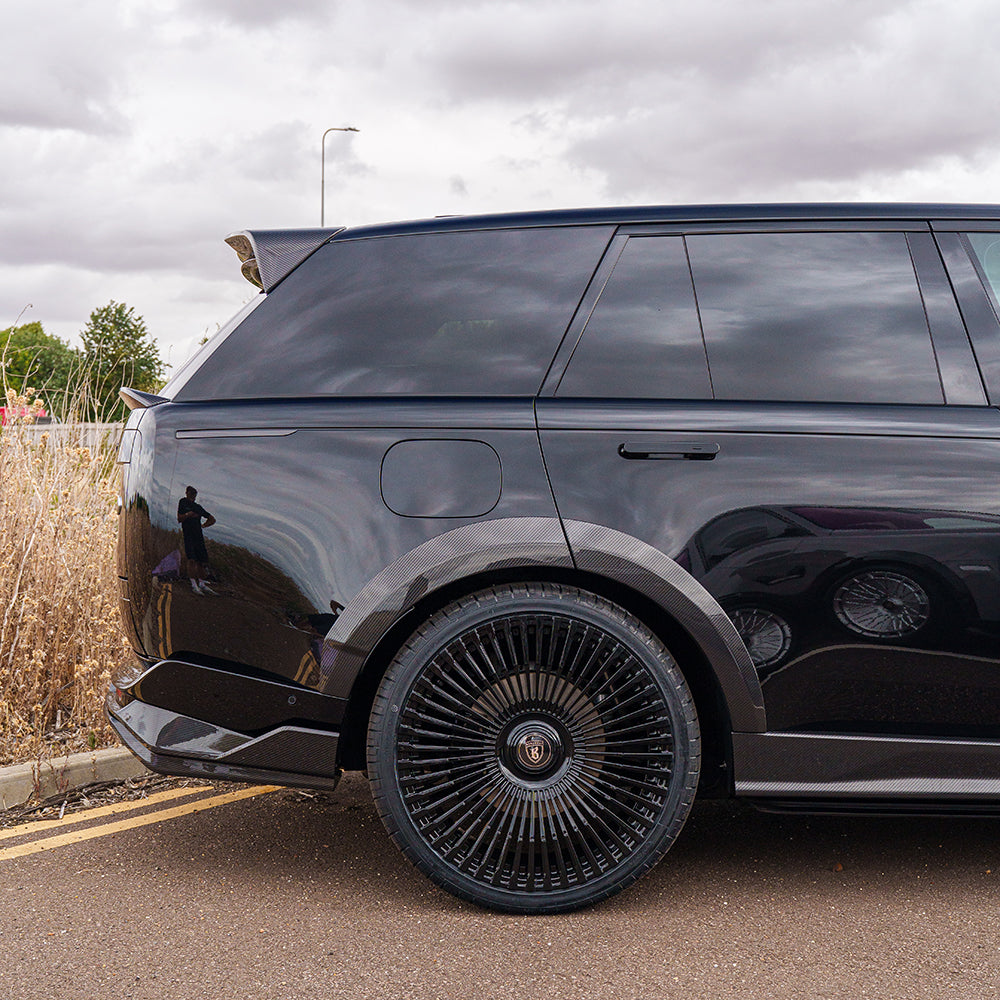 Range Rover L460 (SWB) 2022+ CT Carbon full carbon fiber kit installed on the vehicle, showing sleek, textured carbon fiber details.