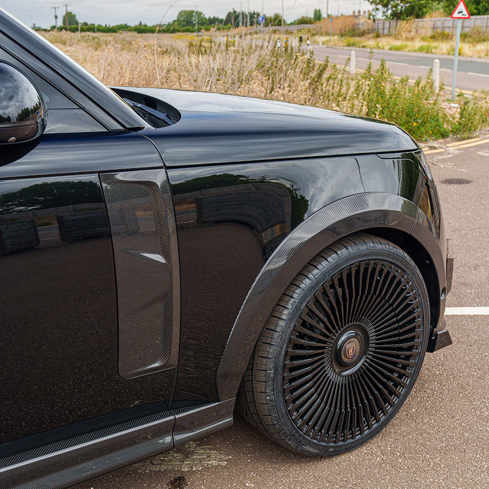 Range Rover L460 (SWB) 2022+ CT Carbon full carbon fiber kit showing sleek, glossy carbon fiber components on the vehicle.