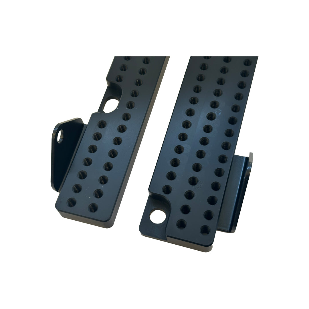 XC3 Engineering seat belt and harness mounting bracket for vehicle interior safety, shown in black with mounting points.