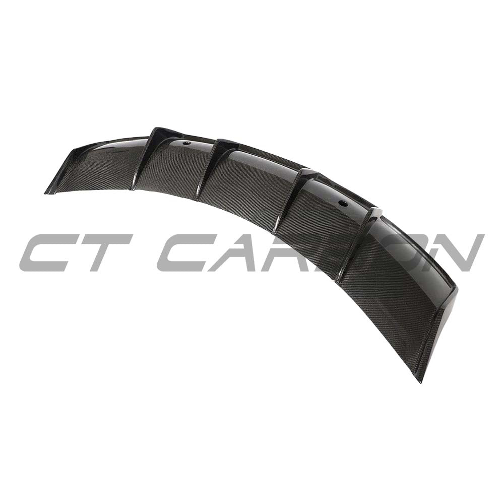 Tesla Model 3 2017-2023 carbon fiber diffuser by CT Carbon, showcasing the sleek V2 design with textured carbon fiber finish.