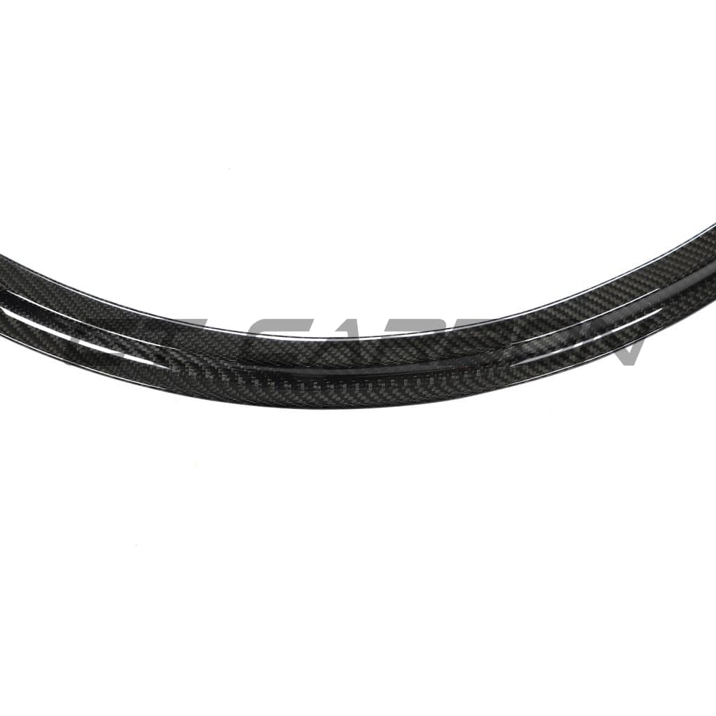 Tesla Model Y 2020-2025 carbon fibre full kit by CT Carbon, includes various exterior parts with a sleek carbon fibre finish.