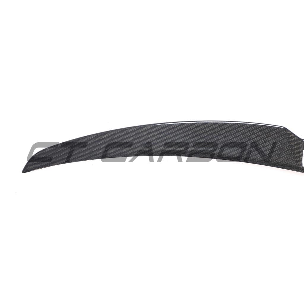 Tesla Model Y MK1 2020-2025 carbon fibre full kit by CT Carbon, showing various carbon fibre panels and parts for the vehicle.