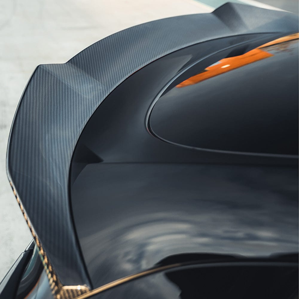 Tesla Model Y 2020-2025 CT Carbon full carbon fibre kit, including front and rear components, installed on the vehicle.