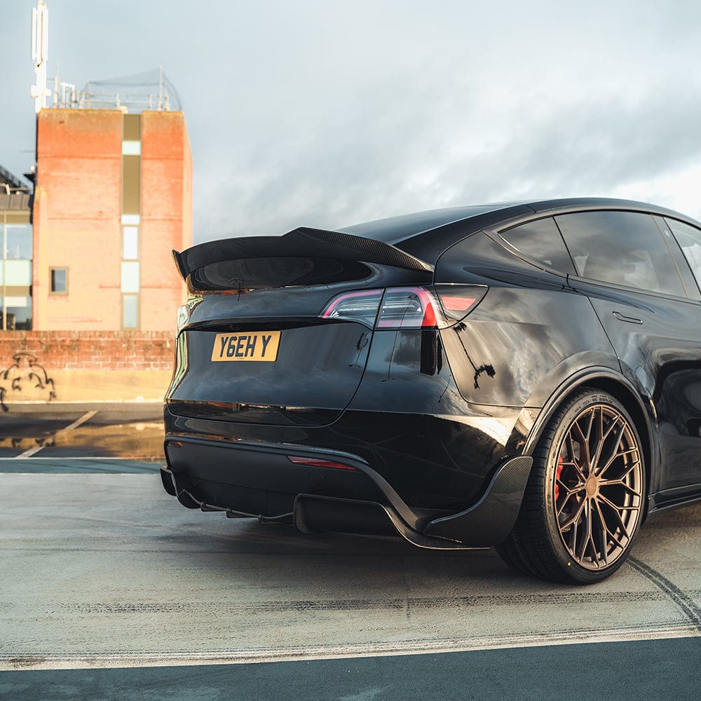 Tesla Model Y MK1 2020-2025 Carbon Fibre Full Kit by CT Carbon, showing sleek carbon fibre panels and components.