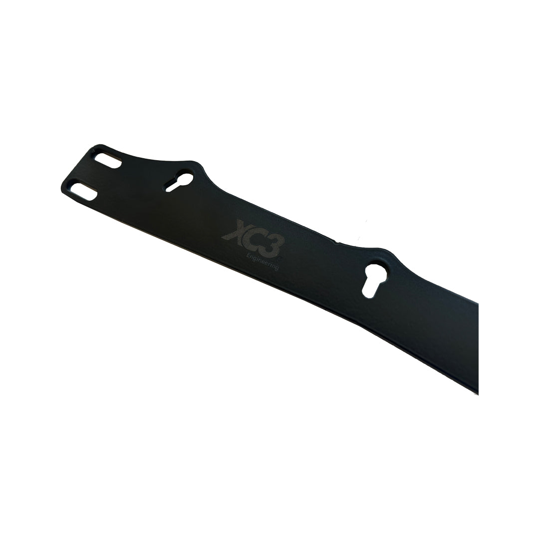 XC3 Engineering under-seat harness bracket for BMW E9X, F8X, and G8X models, designed for safety and interior installation.