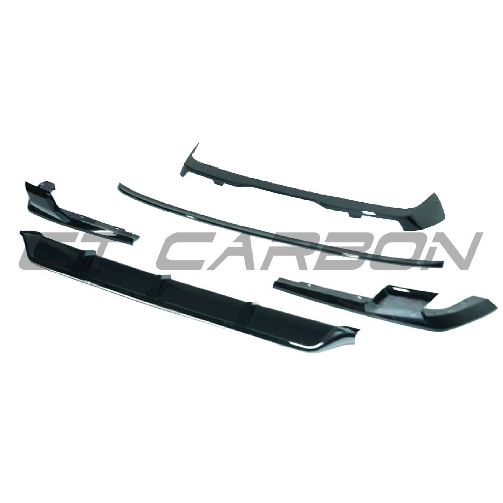 BMW G07 X7 LCI 2022+ CT Carbon full gloss black kit, showing sleek black car parts with reflective finish and detailed design.