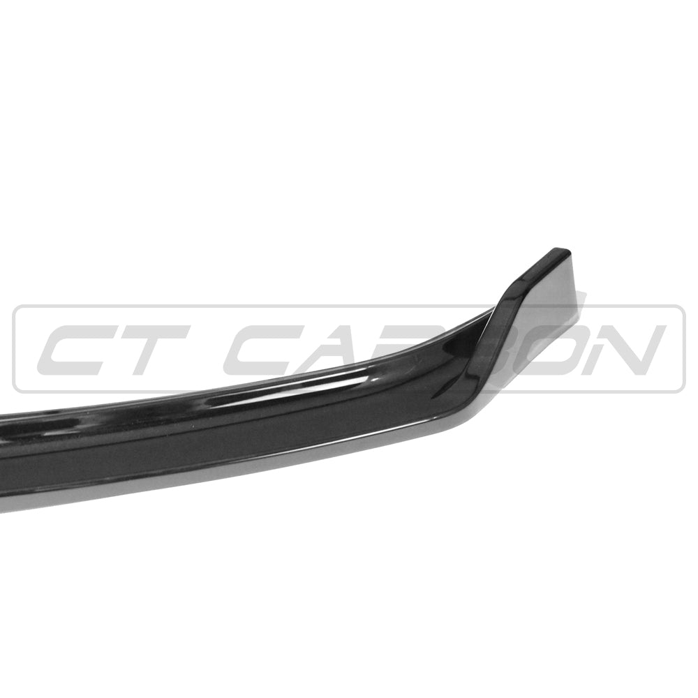 Volkswagen Polo MK5 2014-2017 CT Carbon gloss black splitter installed on front bumper, showcasing sleek aerodynamic design.