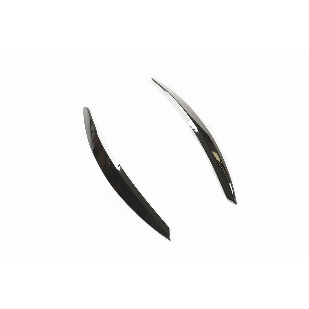 Gloss black headlight eyebrows for Volkswagen Polo MK5 by CT Carbon, accessory enhancing front styling and vehicle aesthetics.