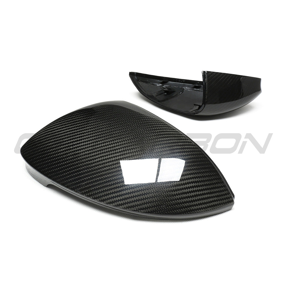 VW Golf MK8 carbon fibre side mirrors by CT Carbon, featuring sleek black finish, without lane assist, showing close-up of mirror housing.