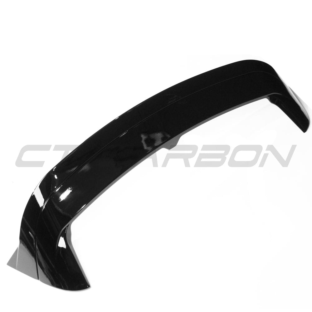 Gloss black VW GOLF MK8 GTI/R 2020+ spoiler by CT Carbon, shown from the side with sleek, aerodynamic design.