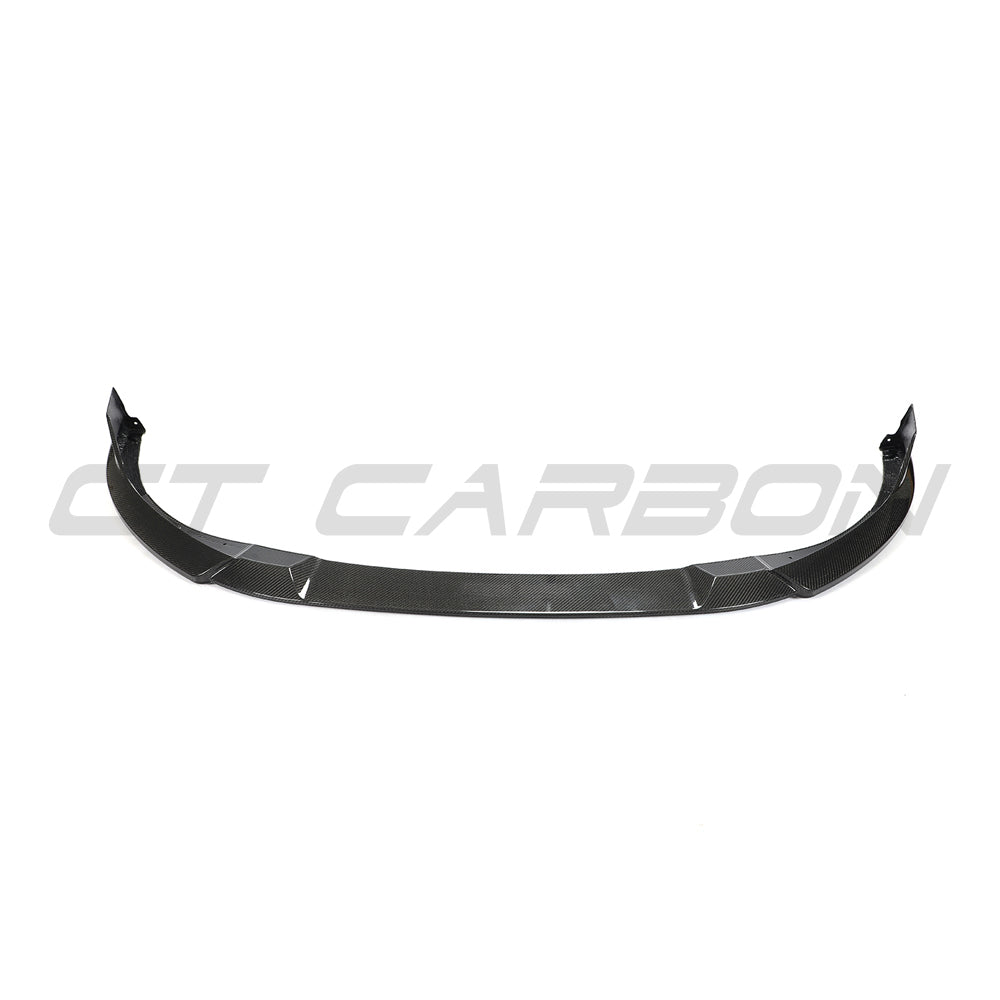 VW Golf MK8 GTI carbon fiber front splitter by CT Carbon, showcasing its sleek, aerodynamic design and textured finish.
