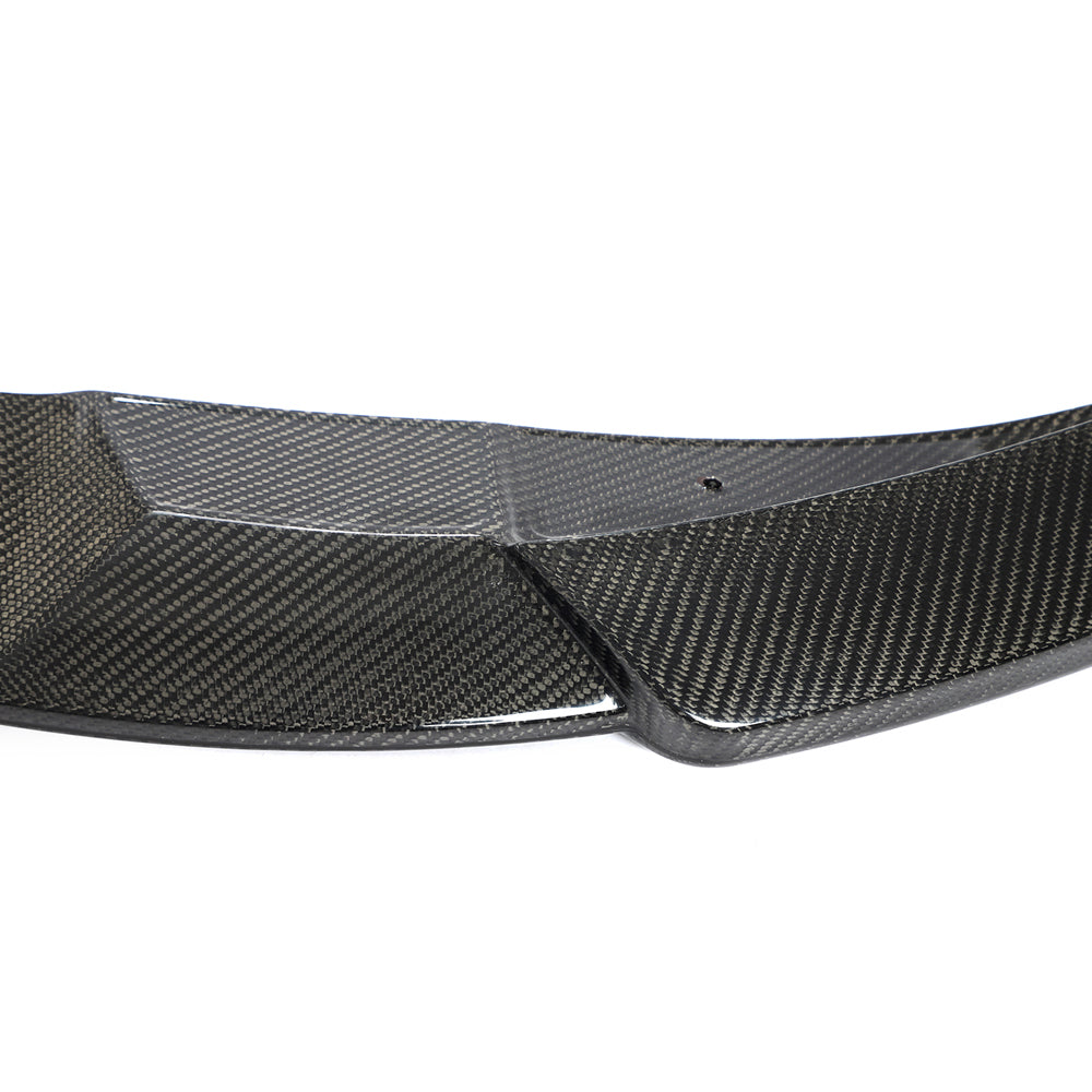 CT Carbon VW Golf MK8 GTI carbon fiber front splitter, showcasing its sleek aerodynamic design and textured finish.