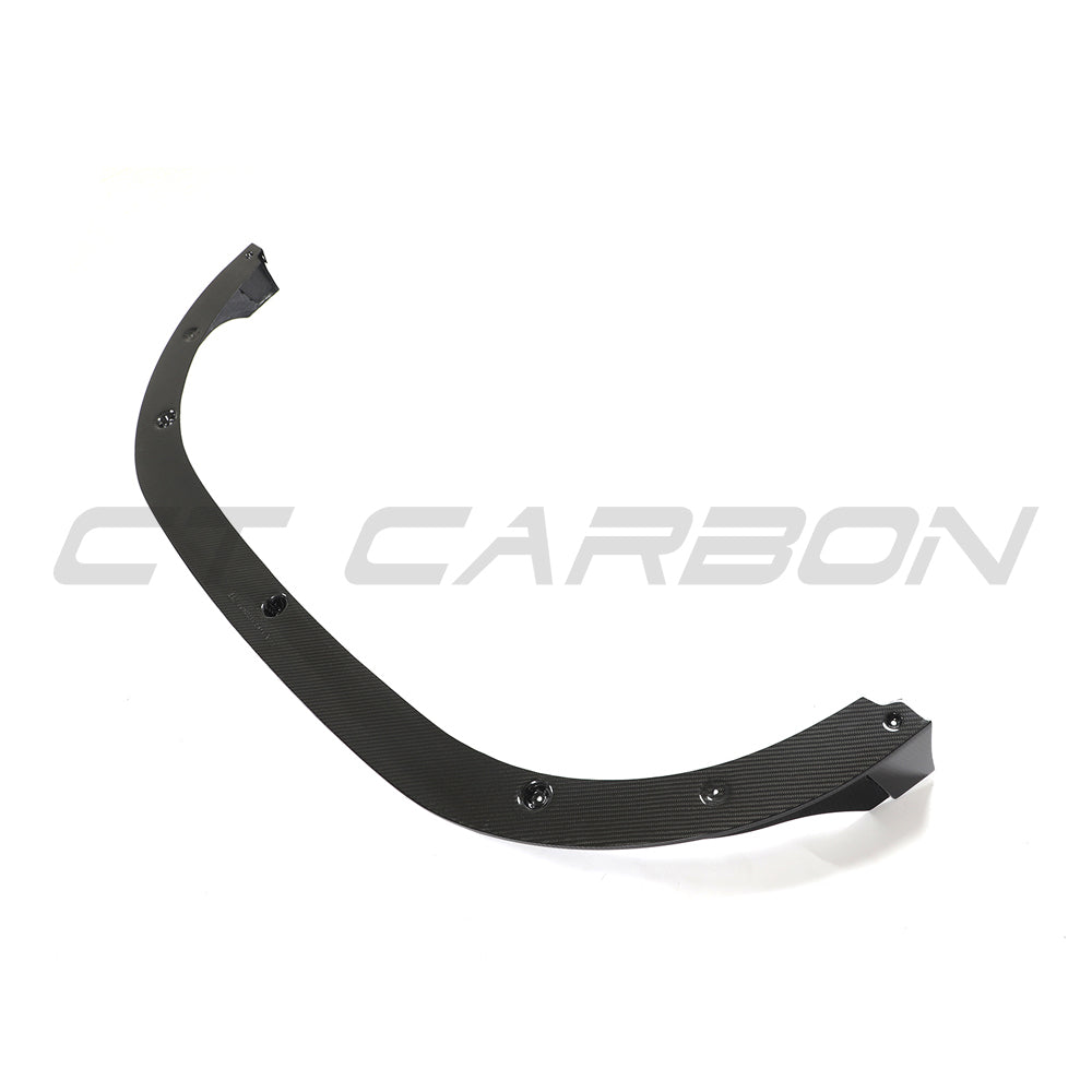 VW Golf MK8 GTI carbon fiber front splitter V2 by CT Carbon, showing the sleek aerodynamic design on the car's front bumper.