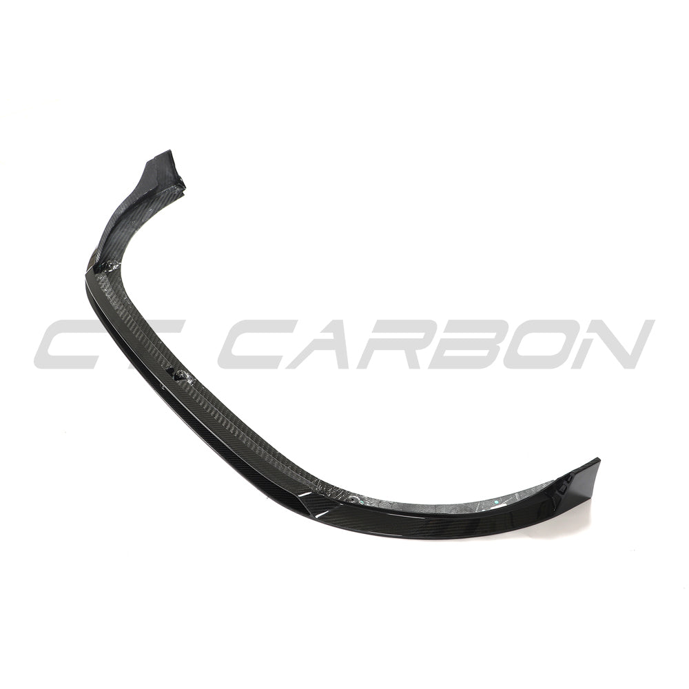 CT Carbon VW Golf MK8 GTI carbon fiber front splitter V2 installed on the front bumper, showcasing its sleek, aerodynamic design.
