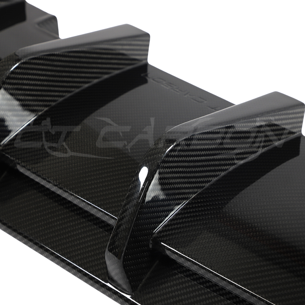 VW Golf MK8/MK8.5 R carbon fibre diffuser by CT Design, showcasing sleek aerodynamic design and textured carbon fiber surface.