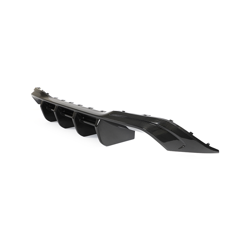 Carbon fiber diffuser for VW Golf MK8 and MK8.5 R models by CT Carbon, shown installed on the rear of the car.