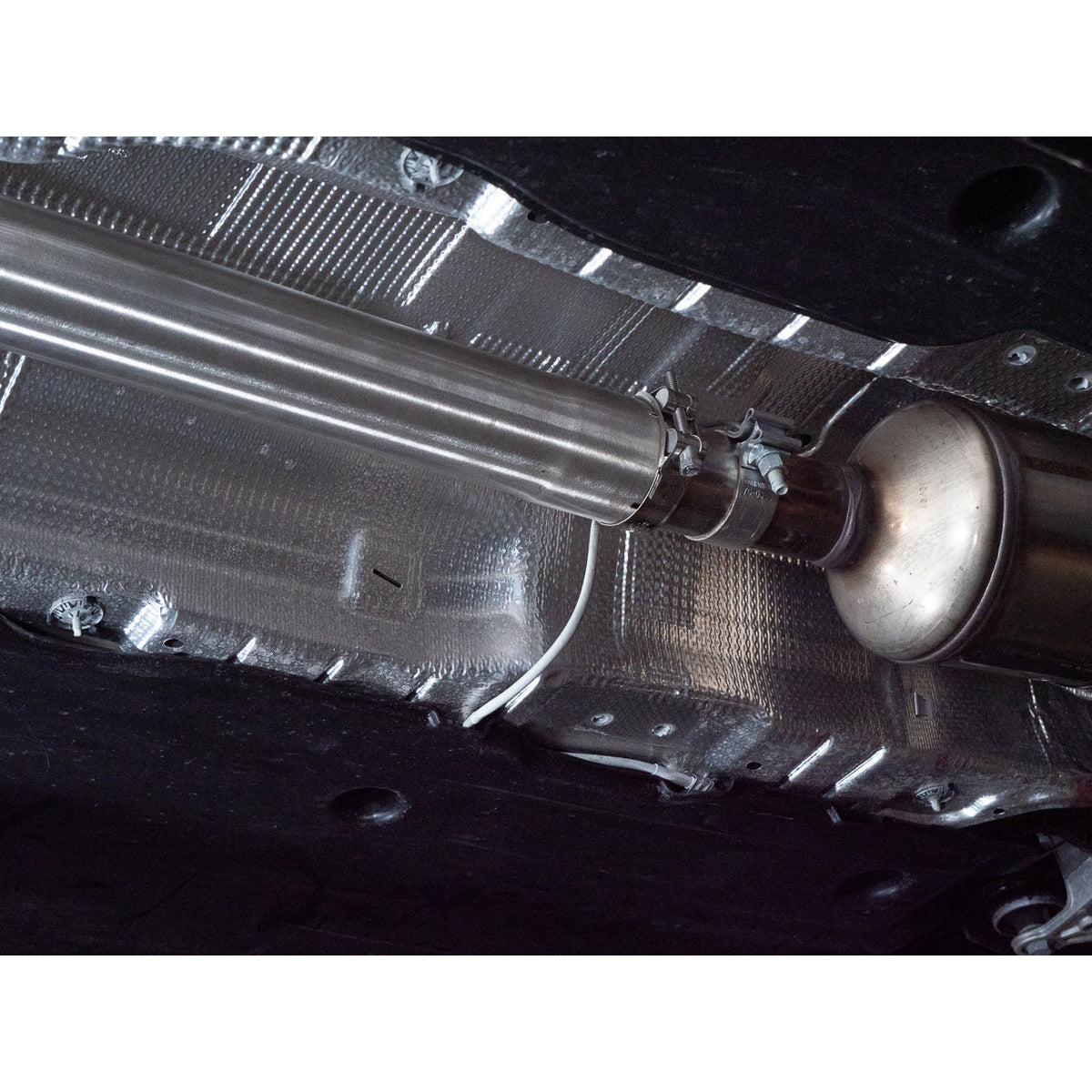 Cobra Sport VW Golf GTI Mk8 2.0 TSI GPF back exhaust with box delete, performance exhaust system showing polished metal and exhaust tips.