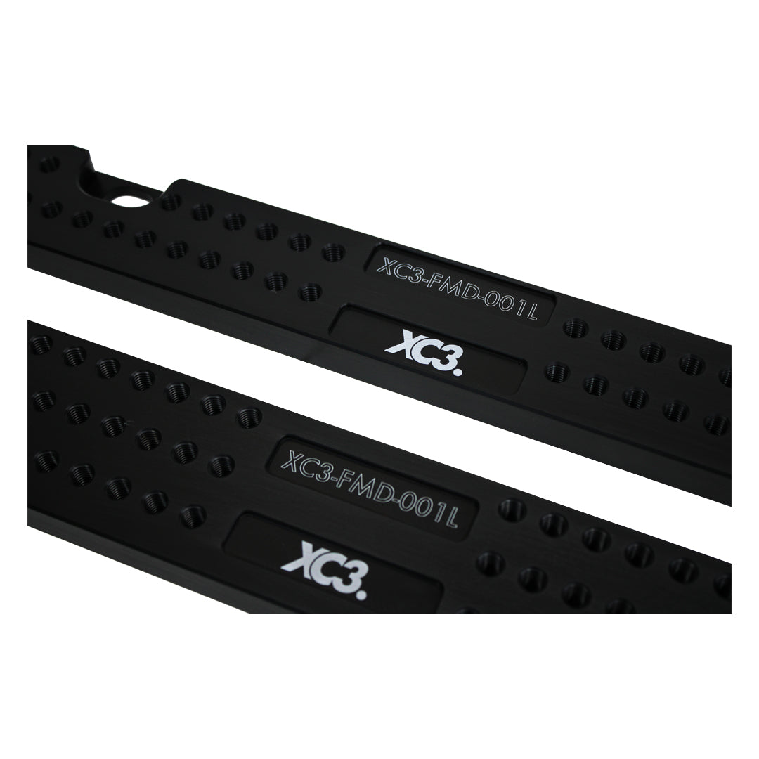 Universal BMW M2 M3 M4 G8X bucket seat base floor mount adapter by XC3 Engineering, shown mounted on vehicle interior floor.
