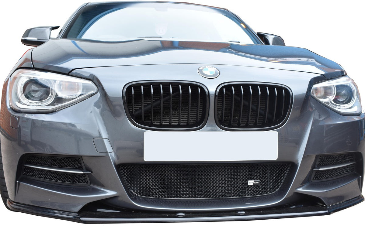 ZunSport BMW M135i front grille set showing sleek black grille design with ZunSport branding and detailed mesh pattern.