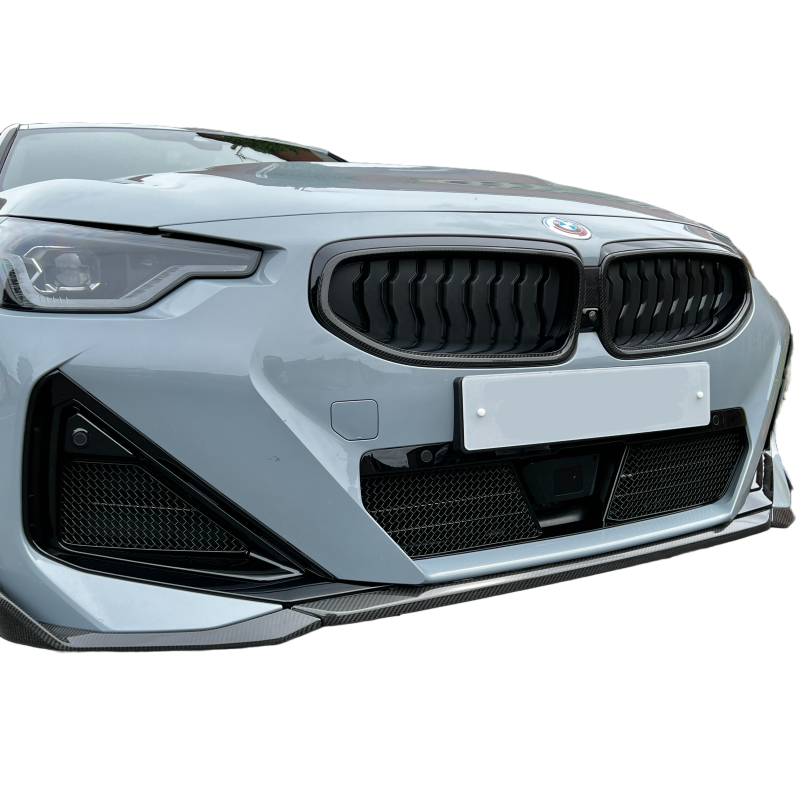 ZunSport front grille set for BMW G42 M240i, black mesh design with brand logo, installed on vehicle front view.