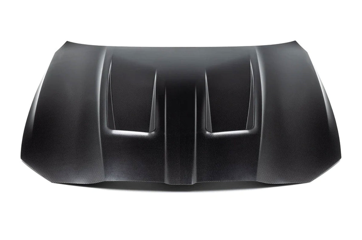 AlphaN carbon vented bonnet for BMW M3 G80 and G82, featuring lightweight carbon fiber design and aerodynamic vents.