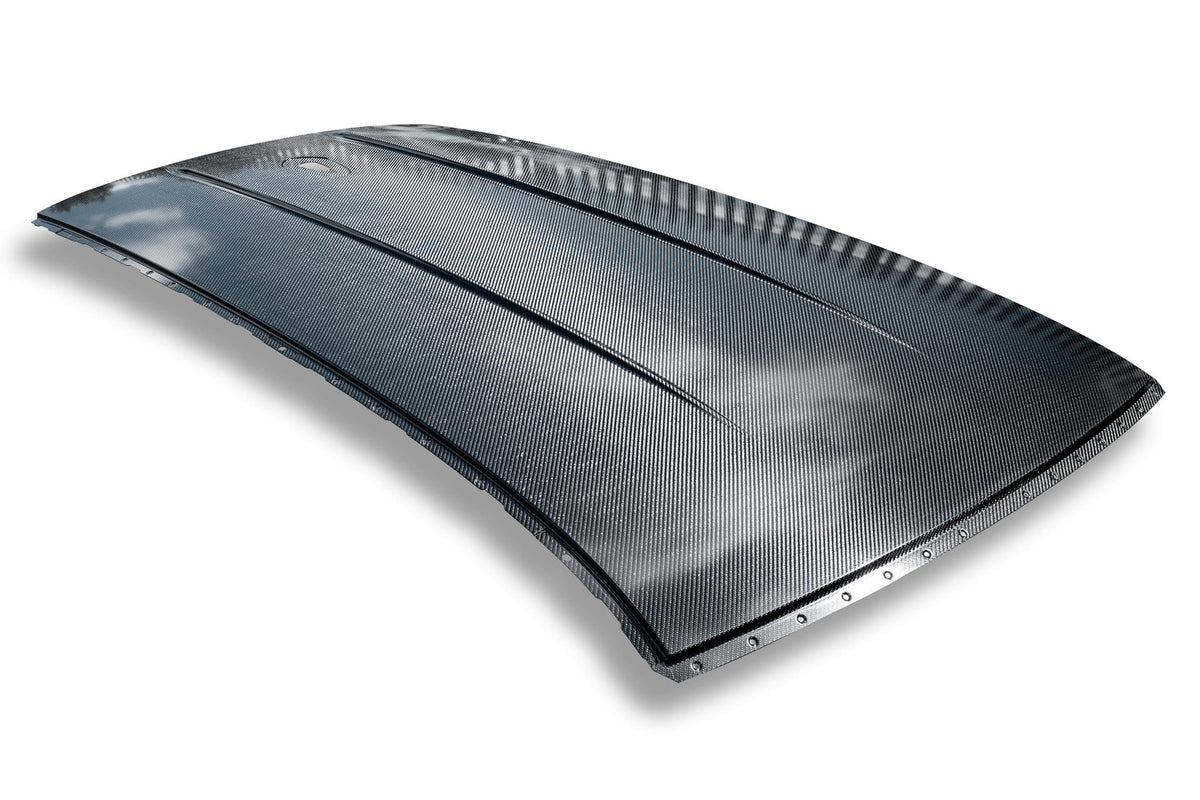 AlphaN carbon roof for BMW M3 G81, showcasing lightweight, high-performance carbon fiber roof with a sleek finish.